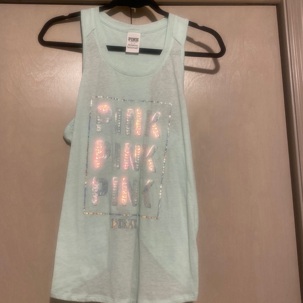 PINK tank size small. New without tags